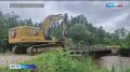 Размытую дорогу в посёлке Кукан засыпали, проезд восстановлен